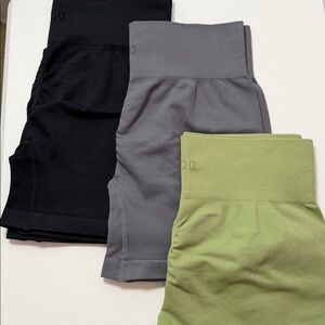 Black, Gray, and Green OQQ butt lifting shorts